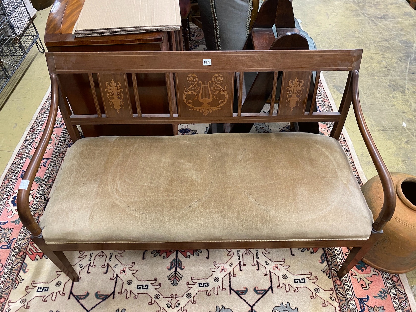 An early 20th century Danish marquetry inlaid mahogany settee, width 125cm, depth 50cm, height 84cm